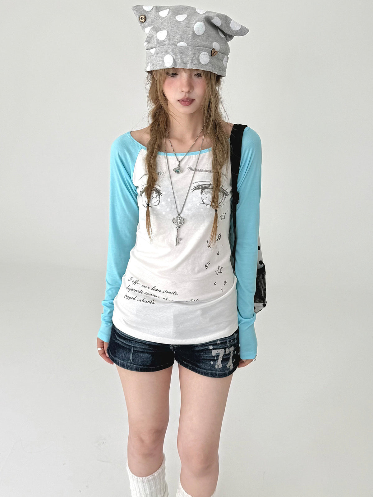 Tear-Eye Graphic Contrast Sleeve Long Sleeve Tee