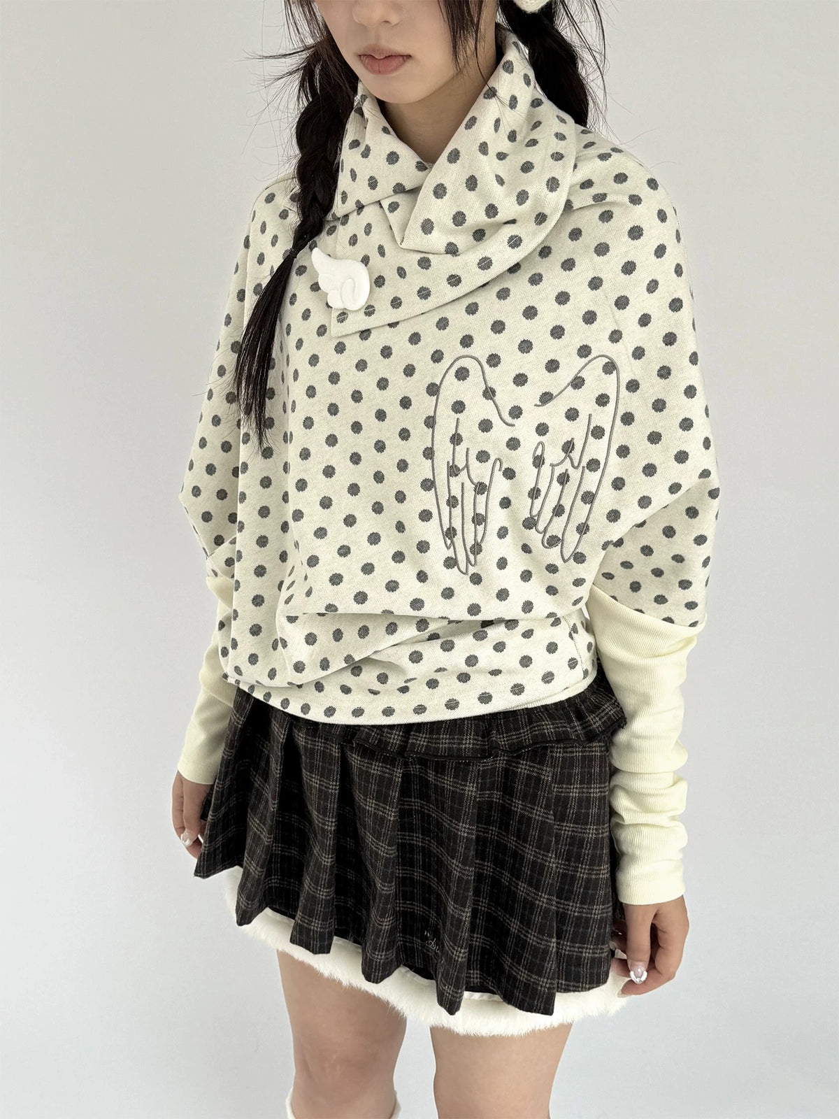 Buttercream Polka Dot Angel Wing Asymmetric Knit Sweater