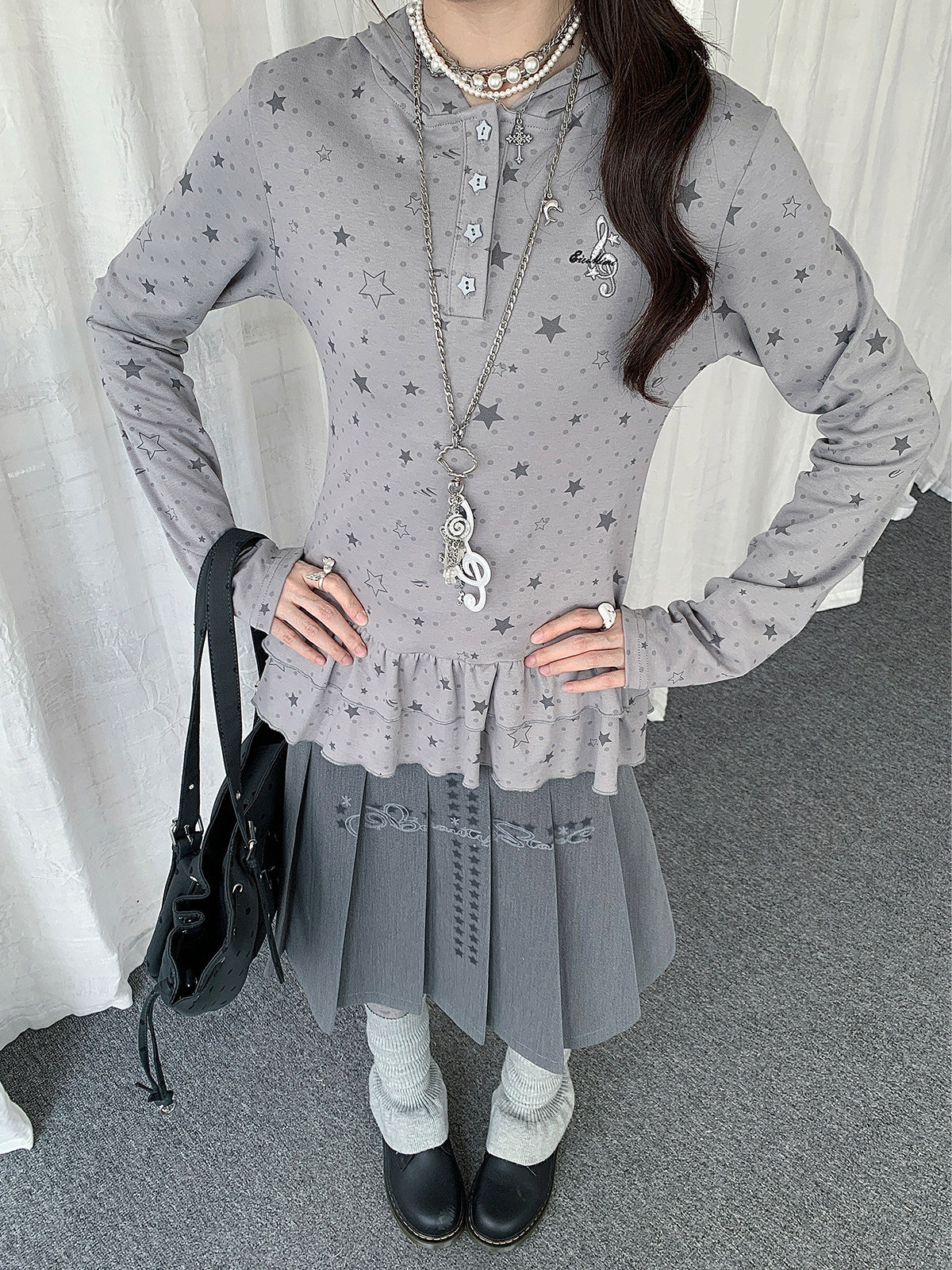 Star Print Ruffle-Hem Hooded Long Sleeve Top