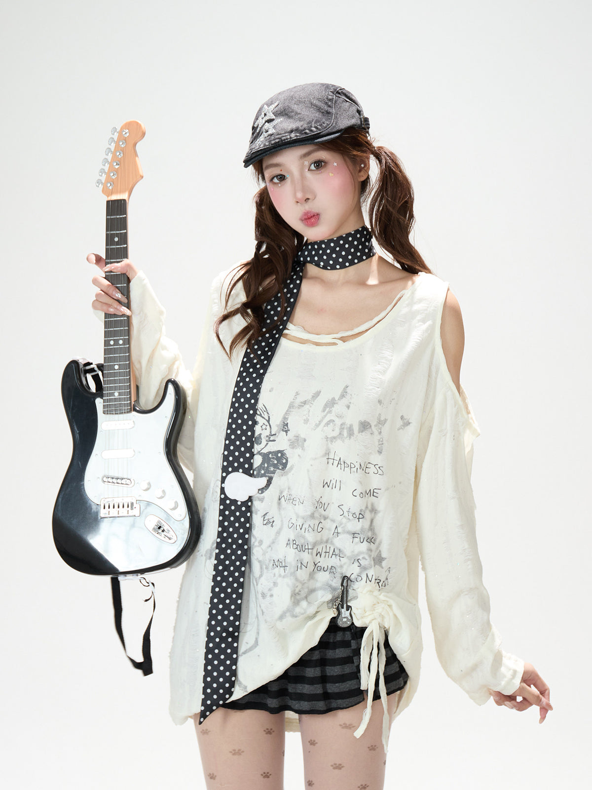 Distressed Cold-Shoulder Graphic Long Sleeve Top & Striped Drawstring Ruffle Mini Skirt