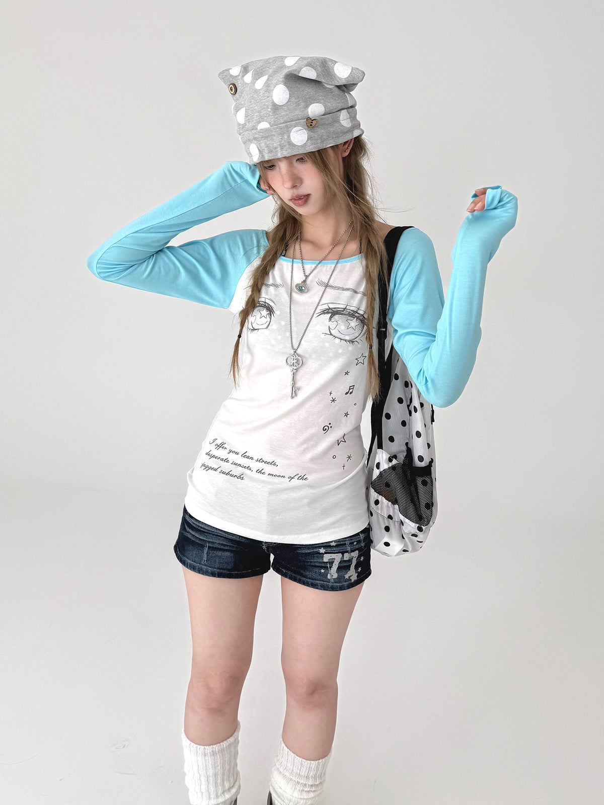 Tear-Eye Graphic Contrast Sleeve Long Sleeve Tee