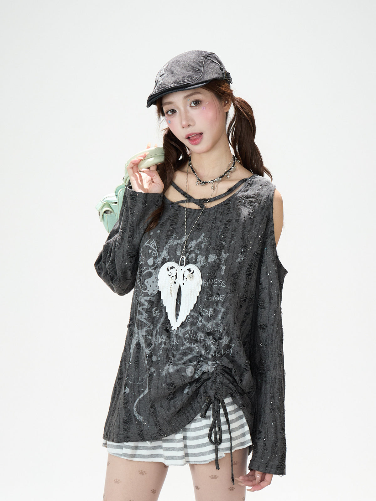 Distressed Cartoon Off-Shoulder Long Sleeve Top & Black Striped Mini Skirt
