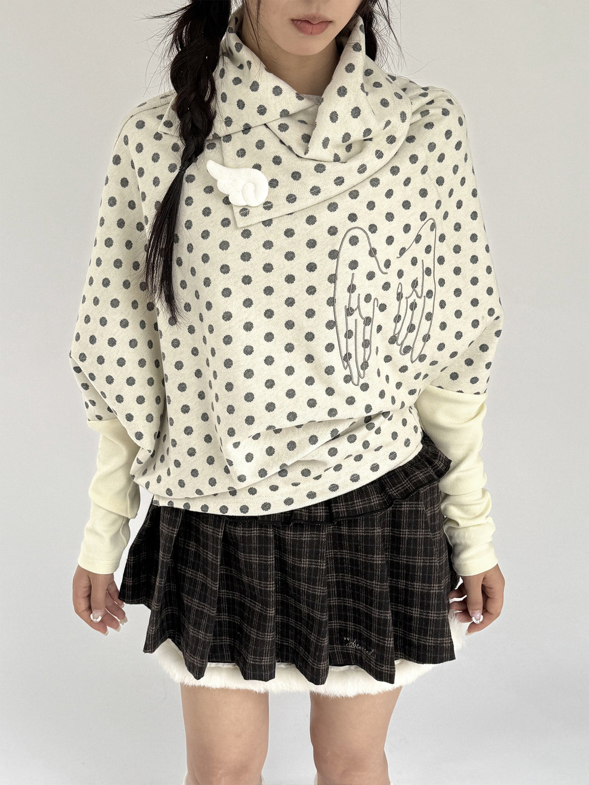 Buttercream Polka Dot Angel Wing Asymmetric Knit Sweater