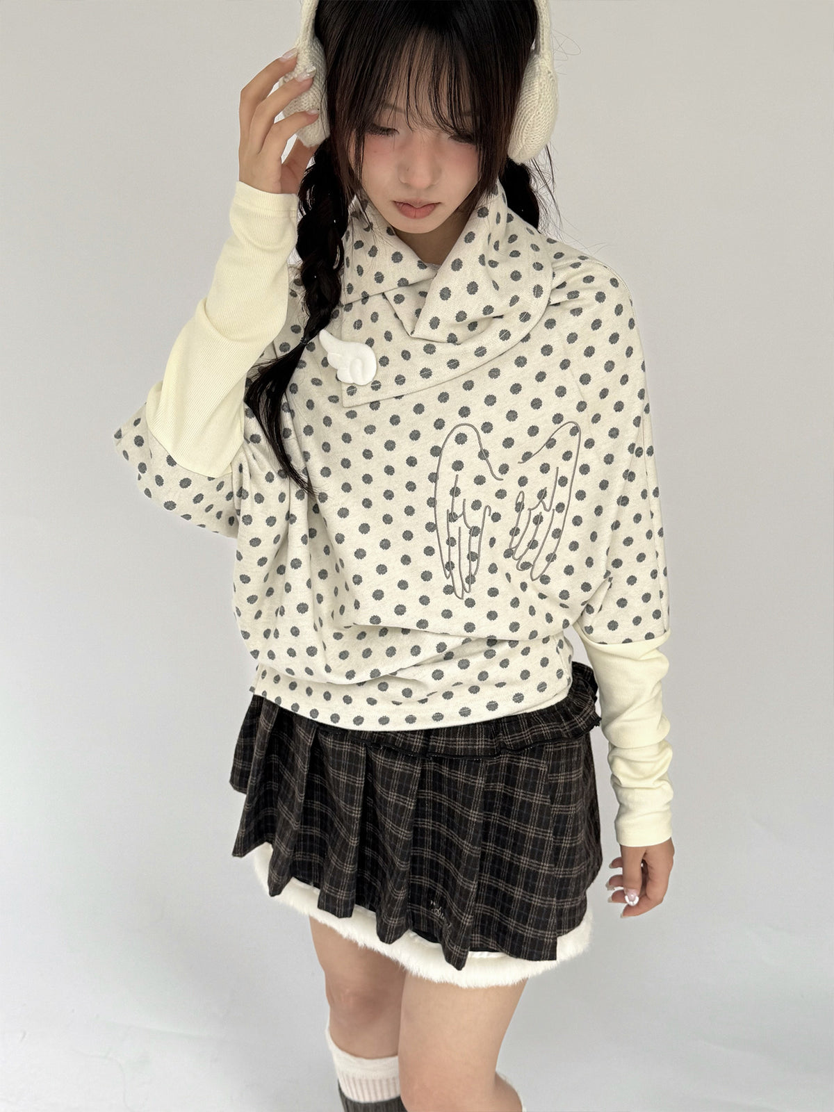 Buttercream Polka Dot Angel Wing Asymmetric Knit Sweater