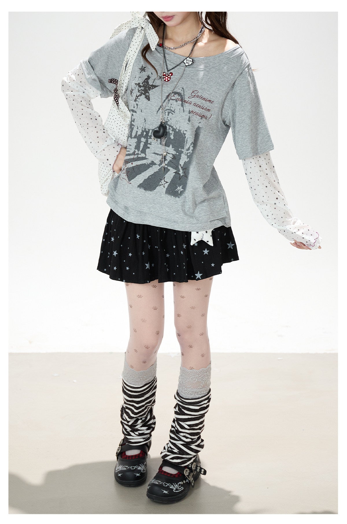 Faux Layered Star Mesh Graphic Long Sleeve Top & Black Star Pleated Mini Skirt