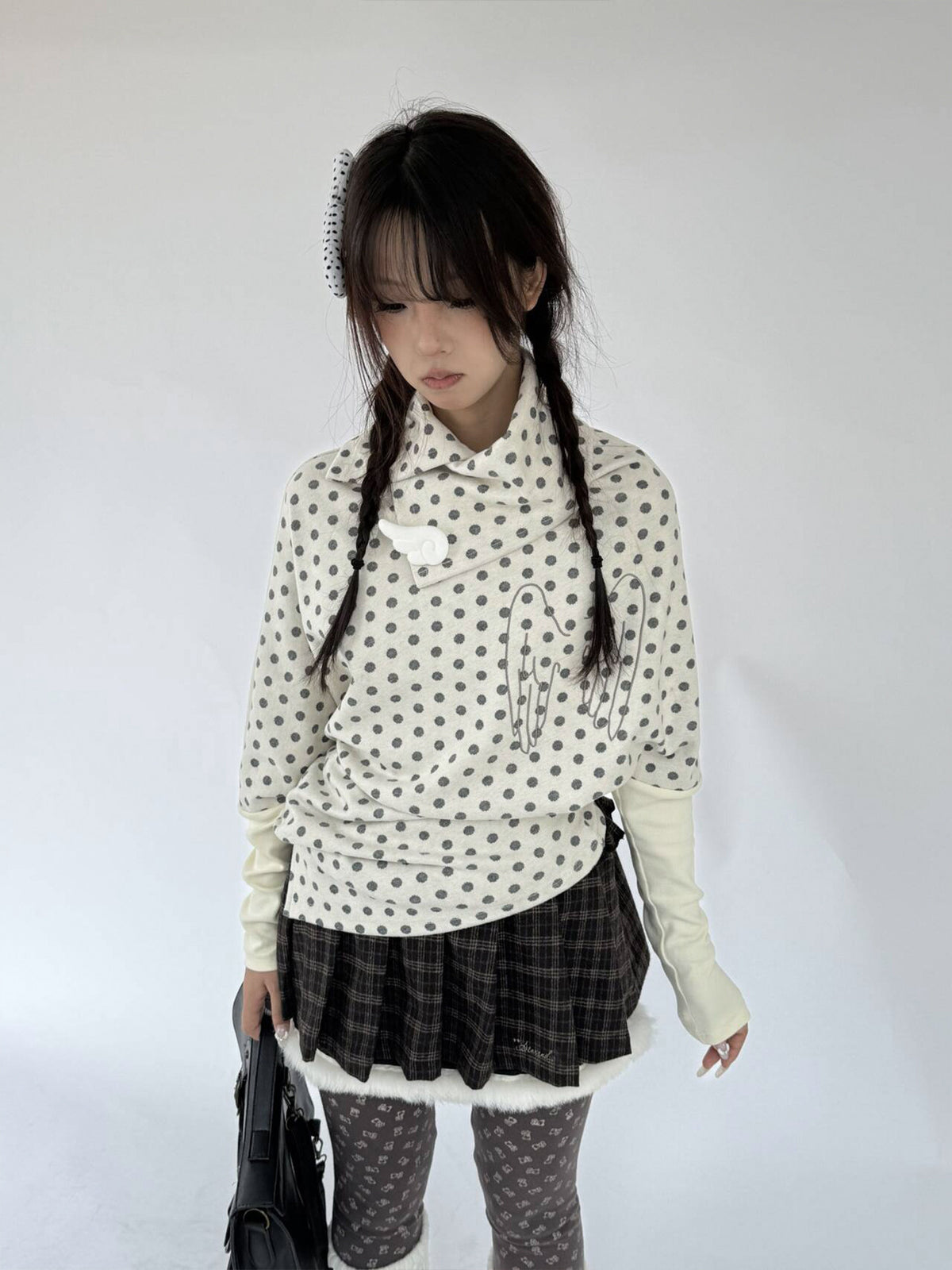 Buttercream Polka Dot Angel Wing Asymmetric Knit Sweater