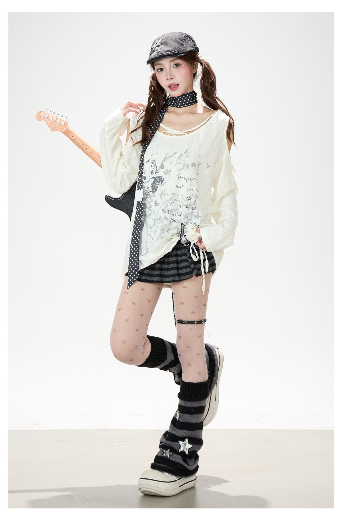 Distressed Cold-Shoulder Graphic Long Sleeve Top & Striped Drawstring Ruffle Mini Skirt