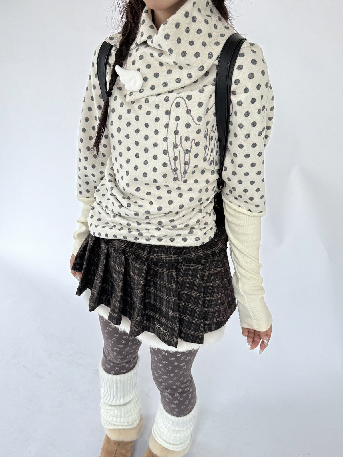 Buttercream Polka Dot Angel Wing Asymmetric Knit Sweater