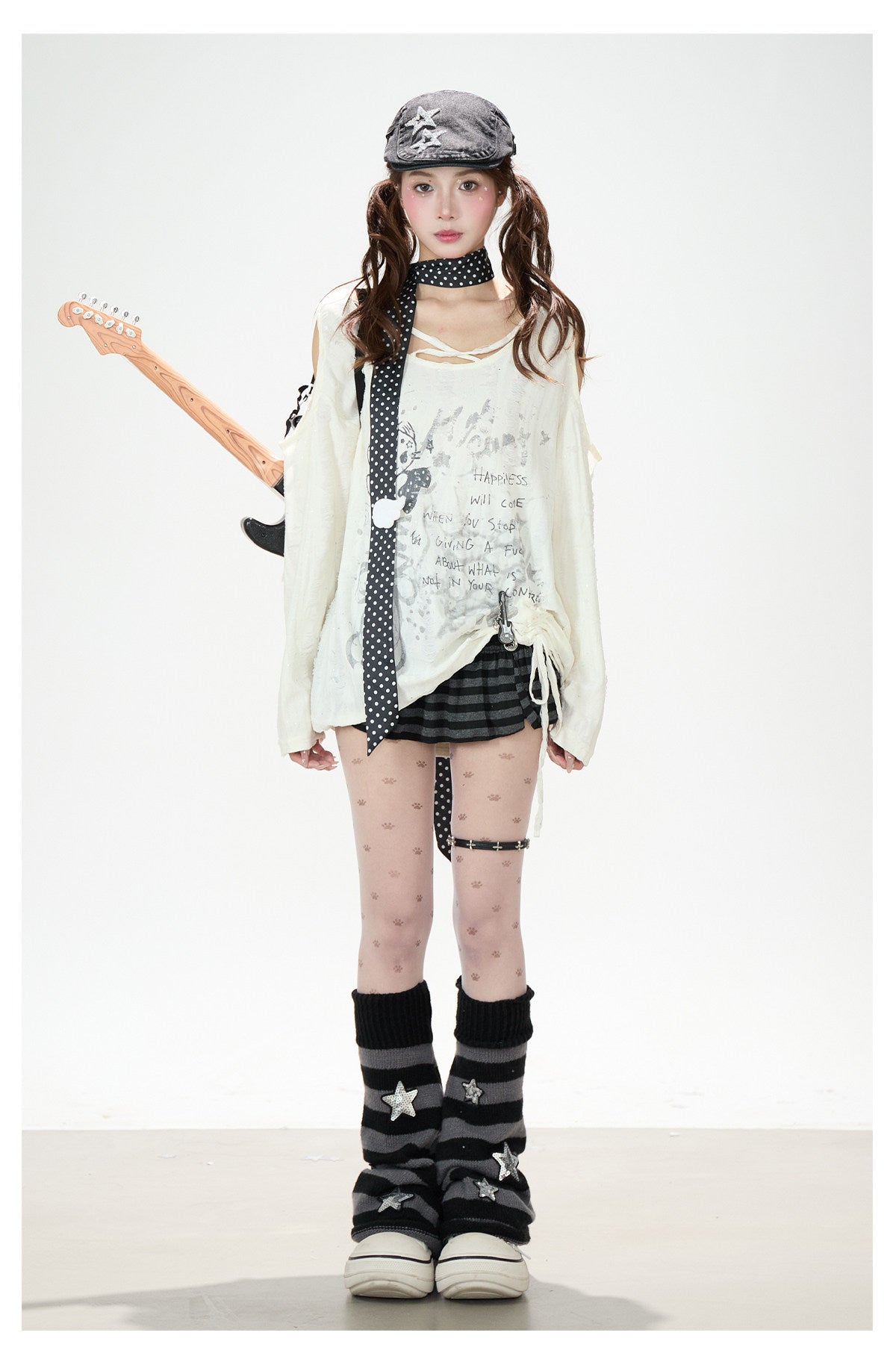 Distressed Cold-Shoulder Graphic Long Sleeve Top & Striped Drawstring Ruffle Mini Skirt