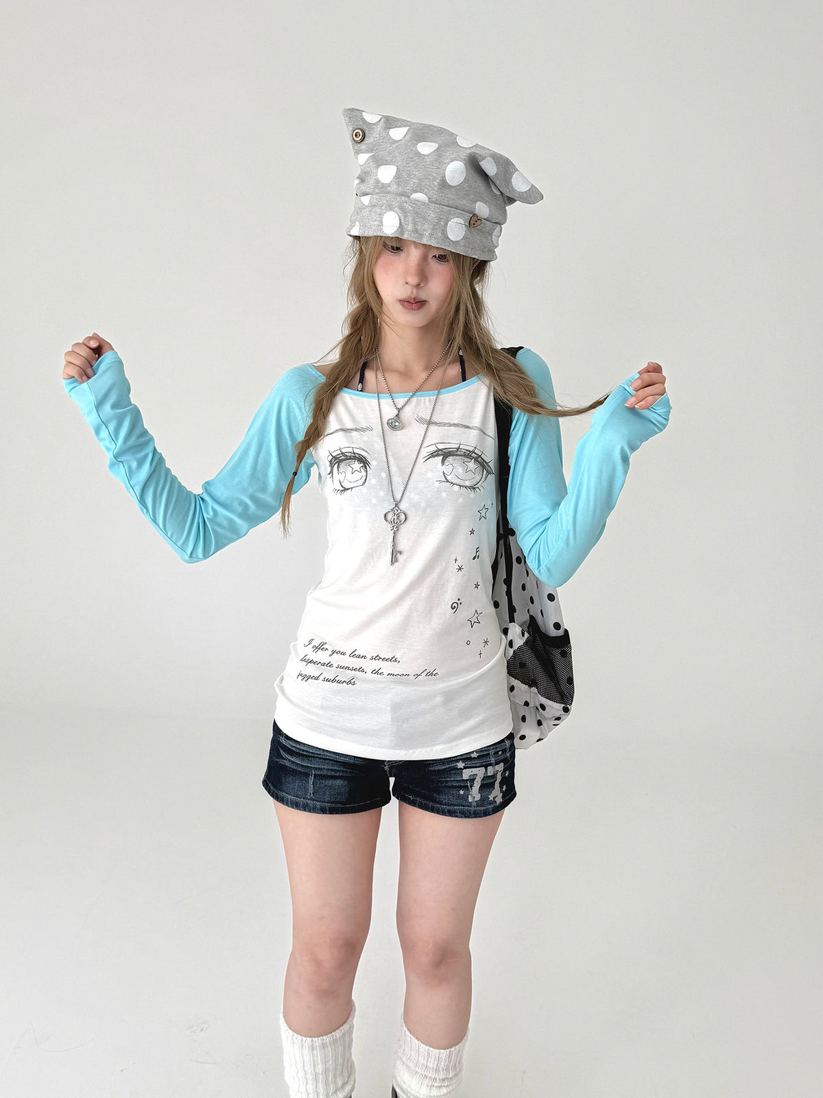 Tear-Eye Graphic Contrast Sleeve Long Sleeve Tee