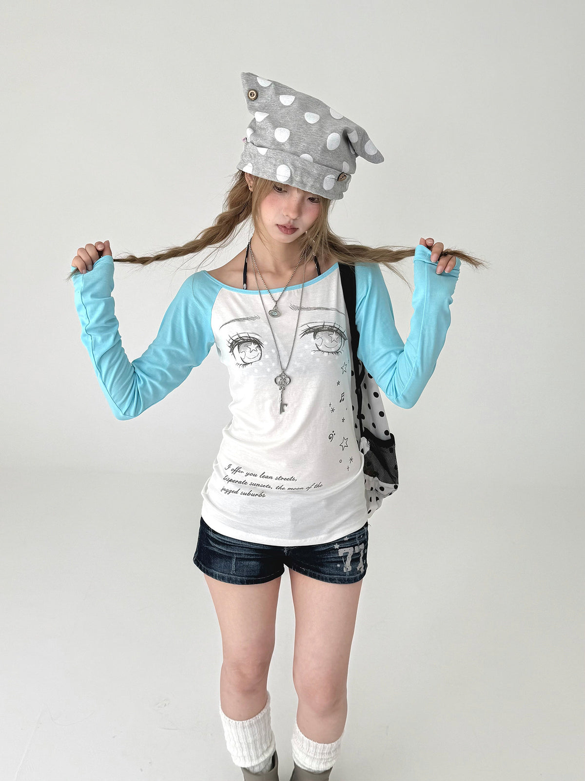 Tear-Eye Graphic Contrast Sleeve Long Sleeve Tee