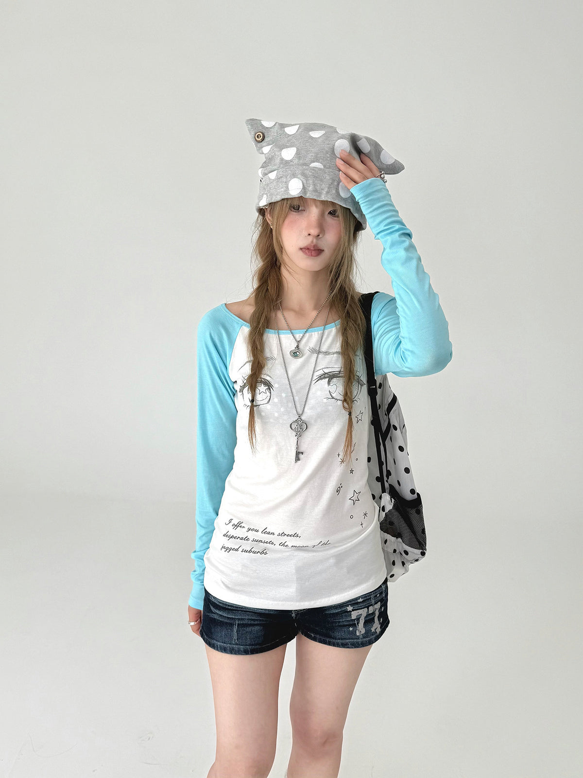 Tear-Eye Graphic Contrast Sleeve Long Sleeve Tee