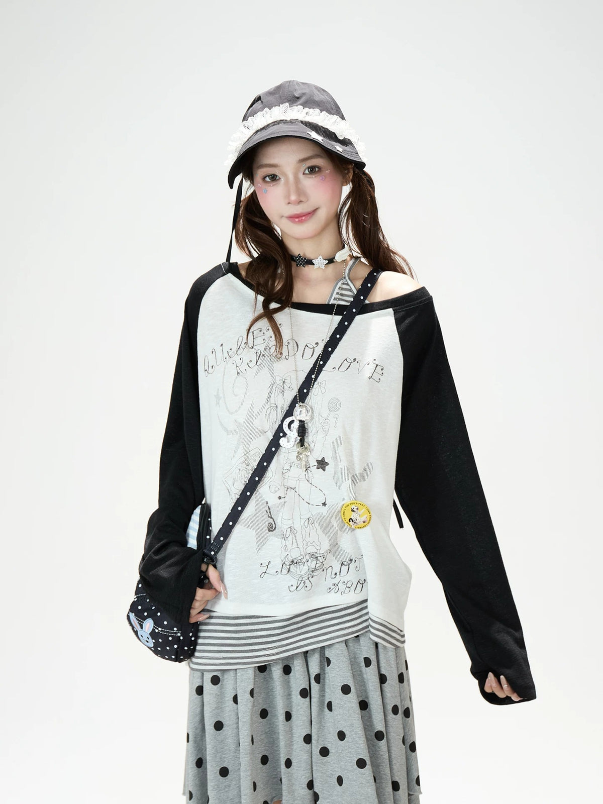Cartoon Girl Off-Shoulder Long Sleeve Top & Asymmetric Polka-Dot Mini Skirt