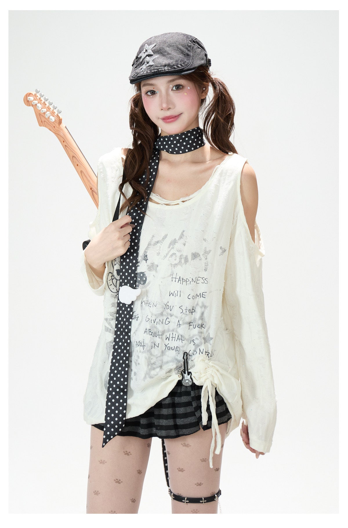 Distressed Cartoon Off-Shoulder Long Sleeve Top & Black Striped Mini Skirt