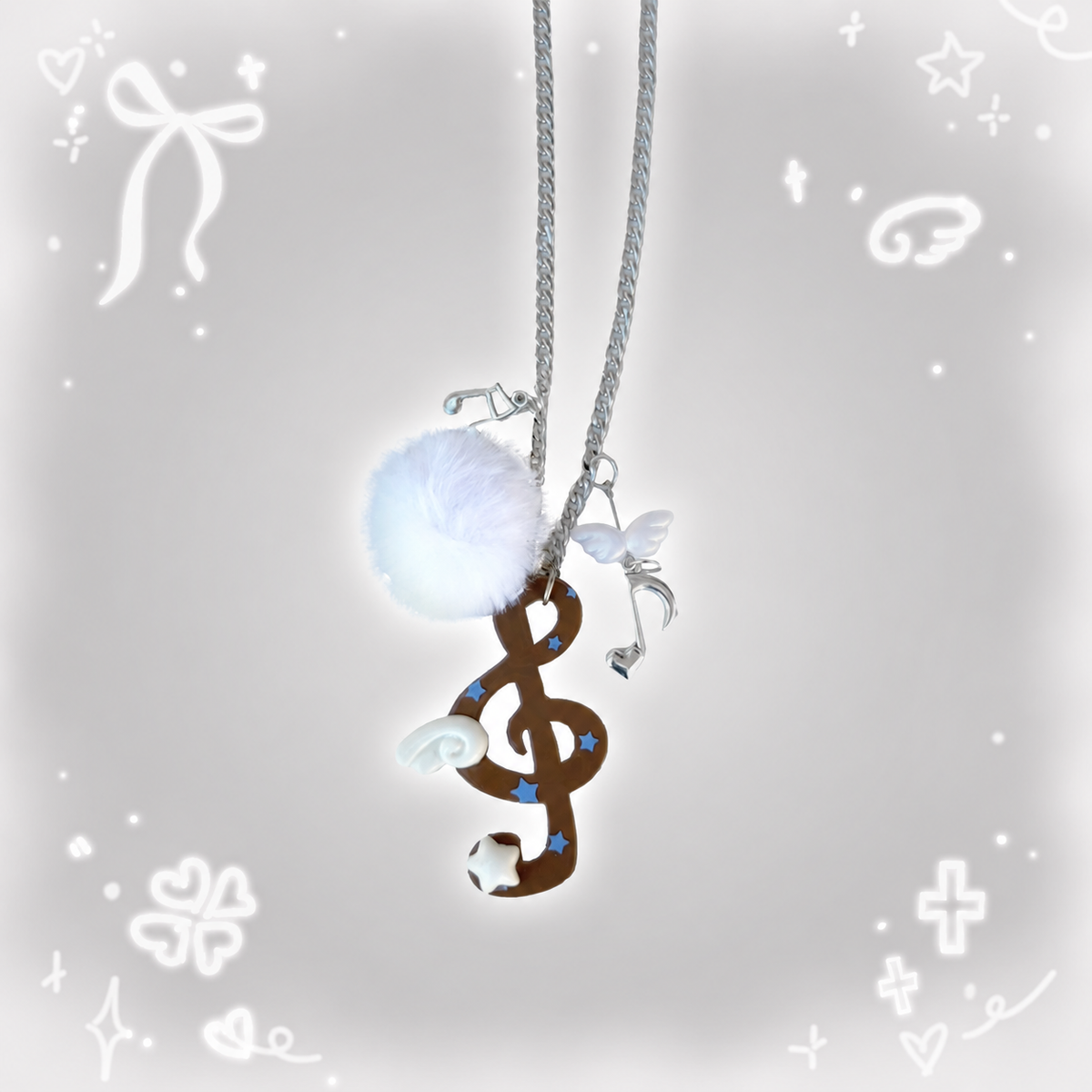 Winged Music Note Pom-Pom Necklace