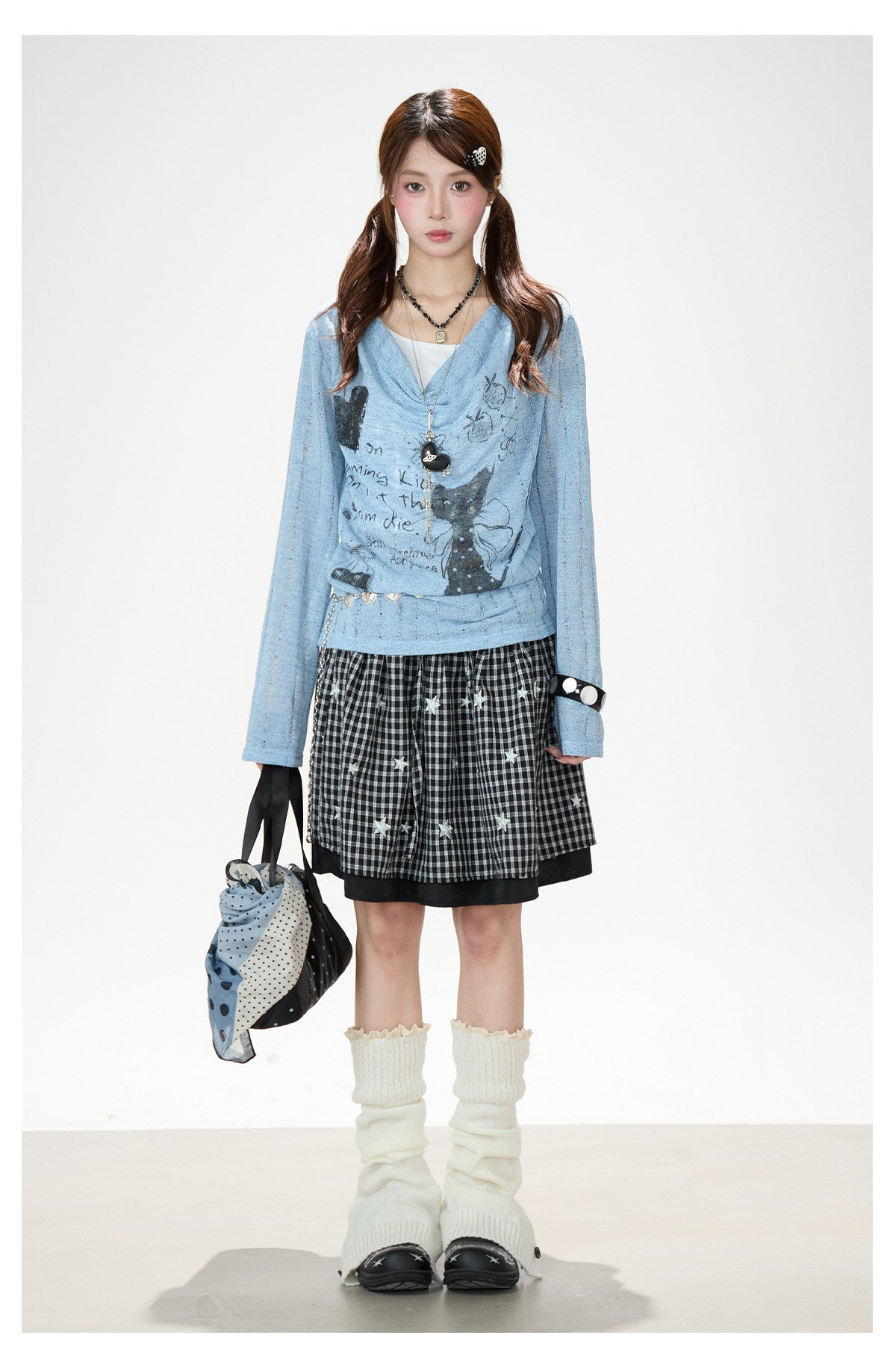 Graffiti Cutout Cowl-Neck Long Sleeve Top & Star Plaid Mini Skirt