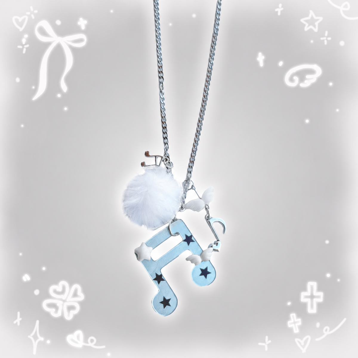 Winged Music Note Pom-Pom Necklace